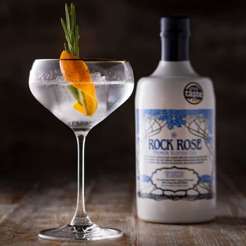 Cocktail served in a branded Rock Rose Gin Coupe Glass
