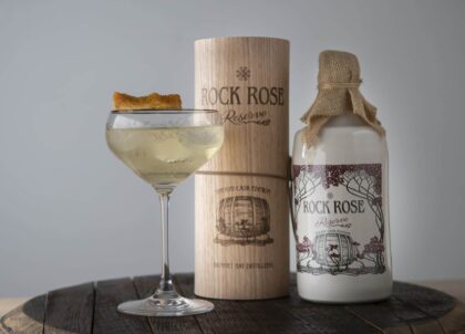 Rock Rose Gin Sherry Cask Edition and perfect serve in a coupe glass garnished with shard of honeycomb