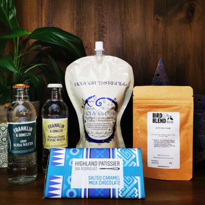 Content of the Refill Rewards Club box for October 2021 including Holy Grass Vodka pouch, soda water, tonic water, birthday cake loose tea and Highland Patisserie chocolate