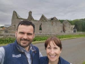 Claire and Martin posing in front of the Castletown Mill building