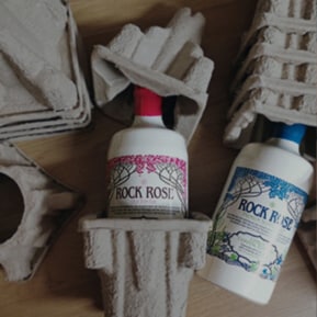 Bottles of Rock Rose Gin in their recyclable packaging