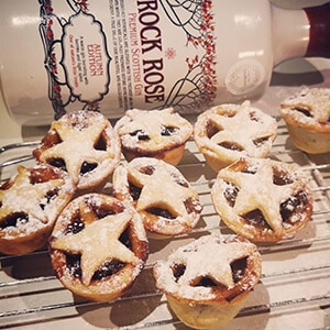 Bottle of Rock Rose Gin Autumn edition and mincemeat pies